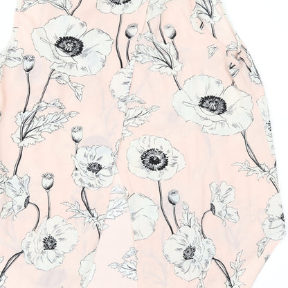 Brand and care label for Primark women’s pink floral tunic blouse, size UK 8