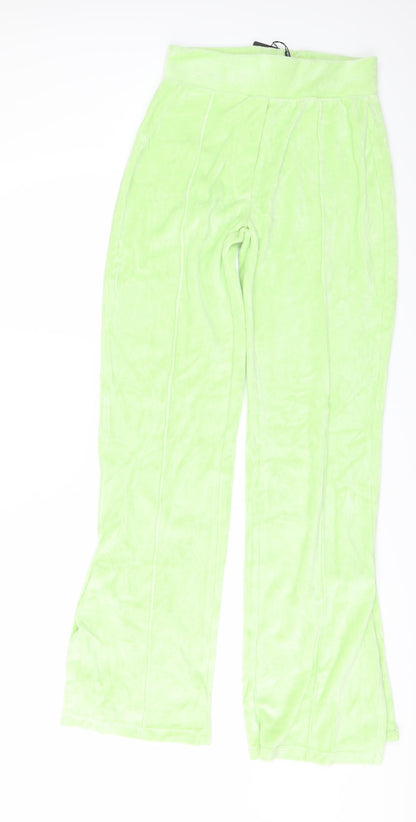 Additional front view of PRETTYLITTLETHING women’s green fleece trousers, size UK 6, 33-inch leg - side splits