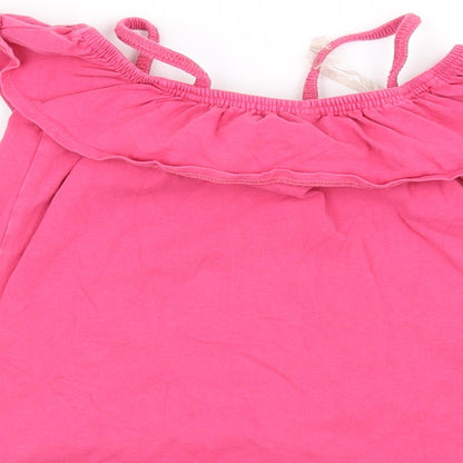 Brand and care label for John Lewis girls’ pink basic t-shirt, size 8, years