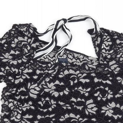 Brand and care label for Preworn women’s blue floral basic blouse, size S