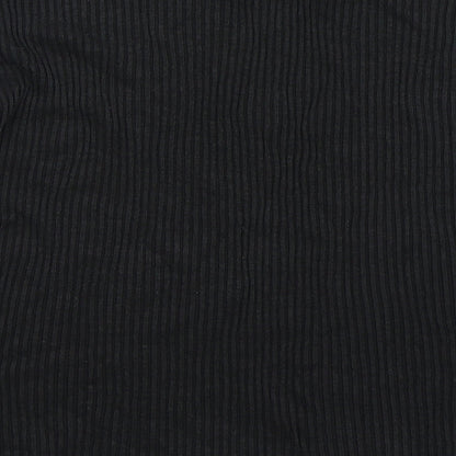 Brand and care label for Carolyn Taylor women’s black jumper, size L