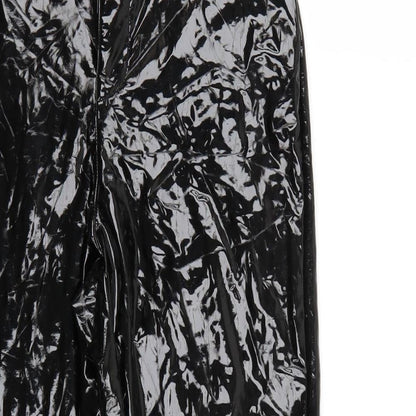 Close-up detail of Missguided women’s black trousers, size UK 10, 27-inch leg