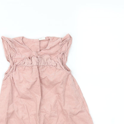 Close-up detail of H&M girls’ pink a-line, size 18-24, months