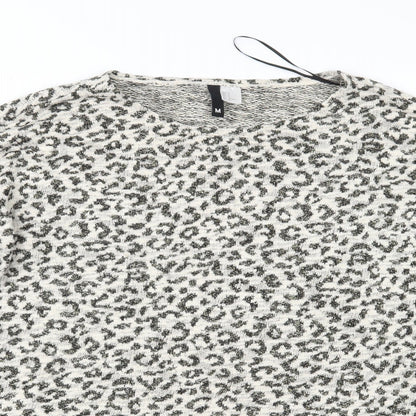 Close-up detail of Divided women’s beige animal print knit jumper, size M