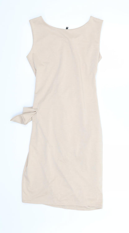 Back view of women’s beige shift, size UK 10