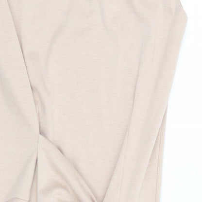 Close-up detail of women’s beige shift, size UK 10