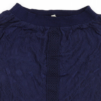 Close-up detail of women’s blue shift, size L