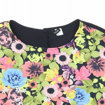 Close-up detail of H&M women’s black floral basic blouse, size UK 12