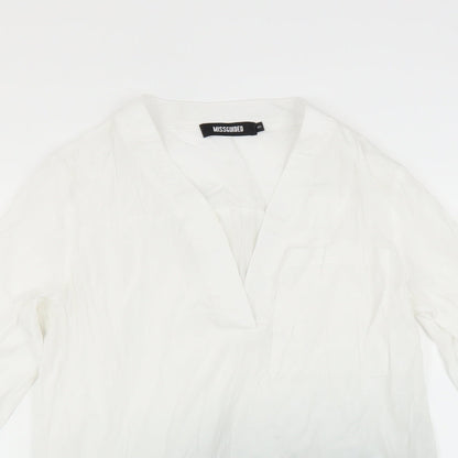 Close-up detail of Missguided women’s grey basic blouse, size UK 6
