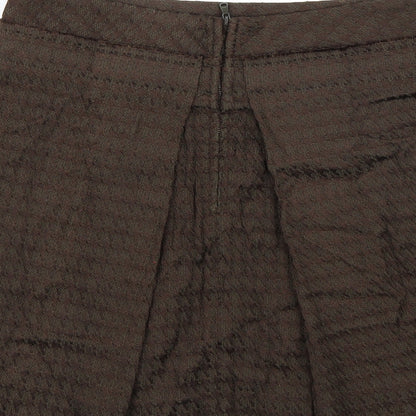 Brand and care label for Pringle women’s brown a-line skirt, size UK 10