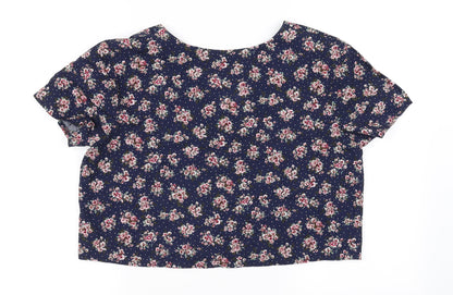 Back view of Nightingales women’s blue floral basic button-up, size UK 16