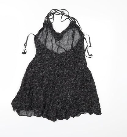 Back view of Atmosphere women’s black polka dot basic blouse, size UK 10