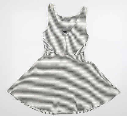 Back view of Divided women’s white striped fit & flare, size UK 8