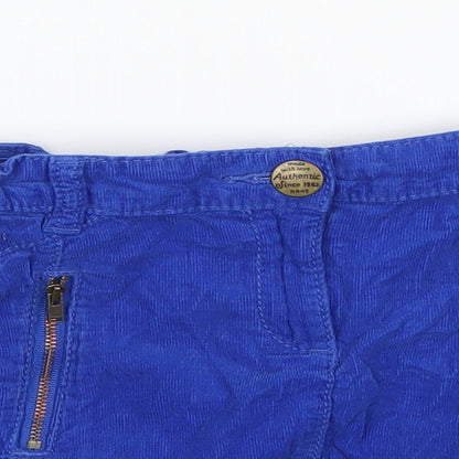 Close-up detail of Next girls’ blue mini skirt, size 7, years