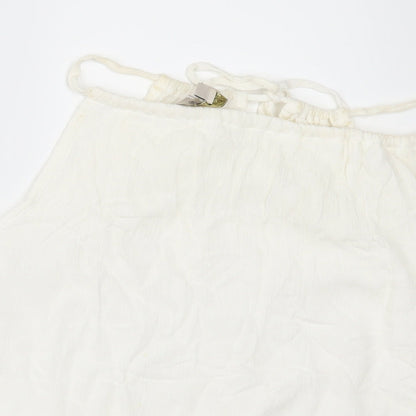 Close-up detail of Parisian Collection women’s white camisole blouse, size L