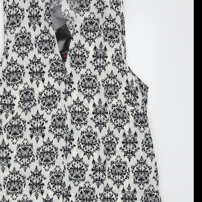 Close-up detail of Peacocks women’s white batik sheath, size M