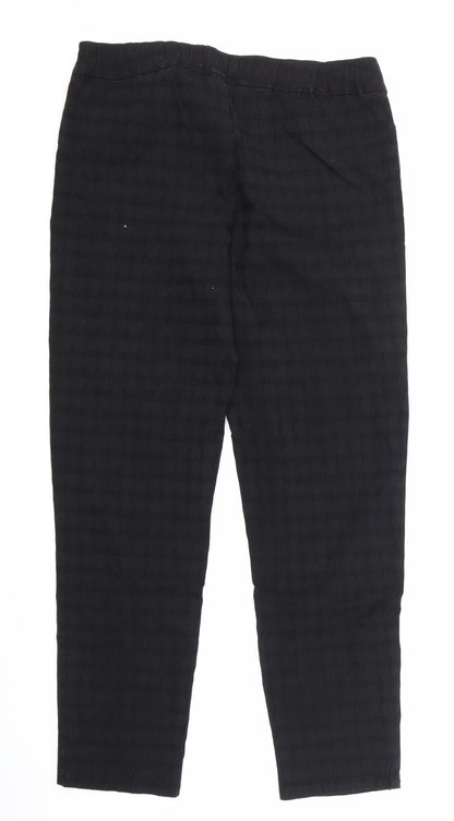 Back view of Gordon Smith women’s black trousers, size UK 16, 30-inch leg