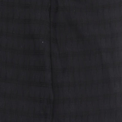 Brand and care label for Gordon Smith women’s black trousers, size UK 16, 30-inch leg