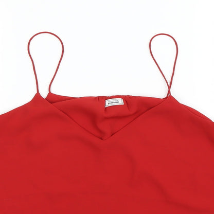 Close-up detail of Pimkie women’s pink camisole tank, size M