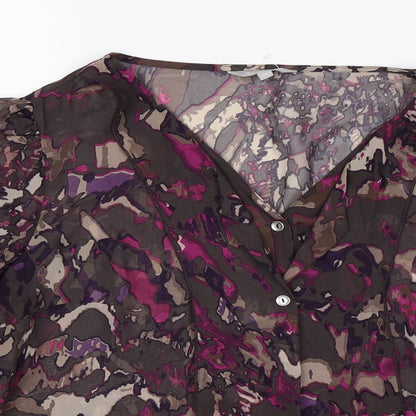Close-up detail of Per Una women’s purple floral chiffon basic blouse, size UK 12, - ruffle front
