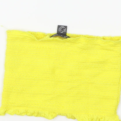 Brand and care label for Primark women’s yellow cropped tank, size UK 4