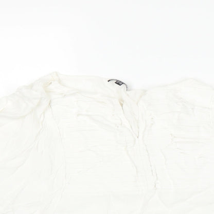 Close-up detail of Warehouse women’s white basic t-shirt, size UK 12