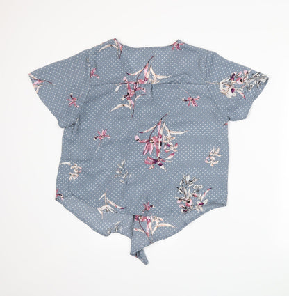 Back view of Urban Romantics women’s blue floral basic blouse, size L
