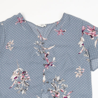 Close-up detail of Urban Romantics women’s blue floral basic blouse, size L