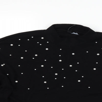 Close-up detail of H&M women’s black jumper, size M