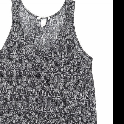 Close-up detail of H&M women’s black geometric basic tank, size S