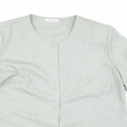 Close-up detail of Berkertex women’s green basic button-up, size UK 18