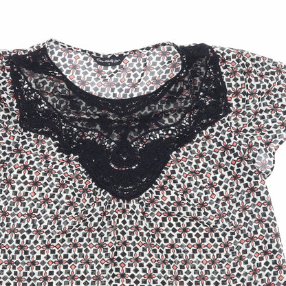 Close-up detail of Miss Selfridge women’s black geometric basic blouse, size UK 8