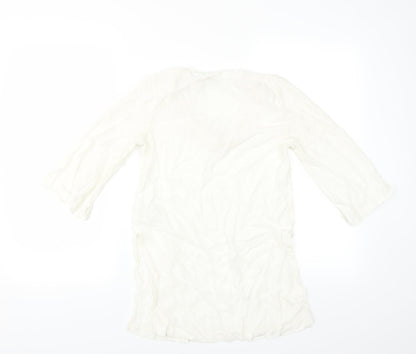Back view of H&M women’s ivory basic blouse, size UK 12