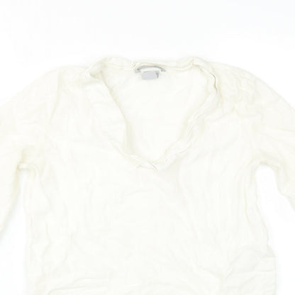 Close-up detail of H&M women’s ivory basic blouse, size UK 12