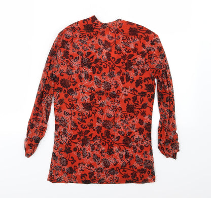 Back view of Preworn women’s orange floral basic blouse, size UK 10
