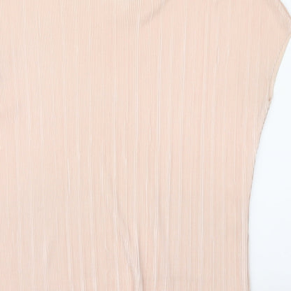 Brand and care label for Missguided women’s pink basic blouse, size UK 6