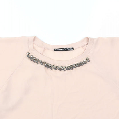 Close-up detail of Atmosphere women’s pink basic blouse, size UK 10