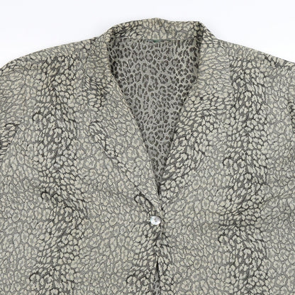 Close-up detail of Preworn women’s multicoloured animal print basic button-up, size UK 20