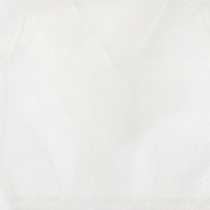 Brand and care label for Primark women’s white polka dot basic blouse, size UK 12