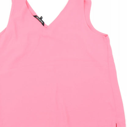 Brand and care label for Debenhams women’s pink basic blouse, size UK 16