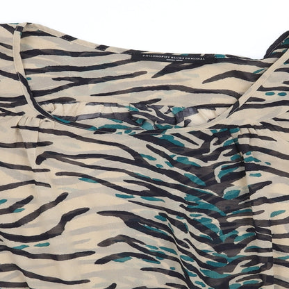 Close-up detail of Preworn women’s beige animal print basic blouse, size UK 14
