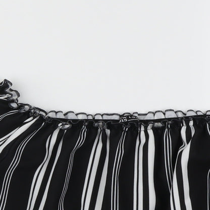 Close-up detail of New Look girls’ black striped basic blouse, size 12, years