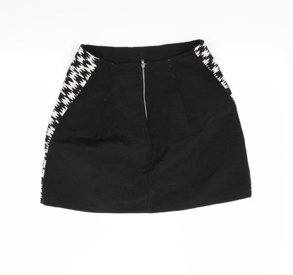 Back view of Primark women’s white mini skirt, size UK 10