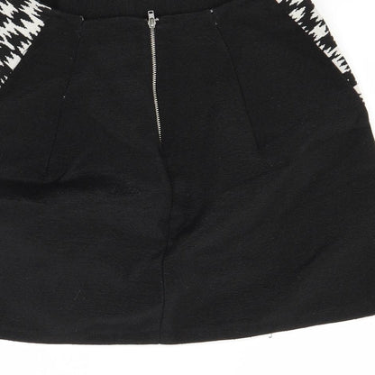 Brand and care label for Primark women’s white mini skirt, size UK 10