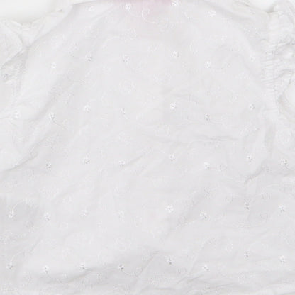 Brand and care label for Penelope Mack girls’ white floral woven basic button-up, size 2, years
