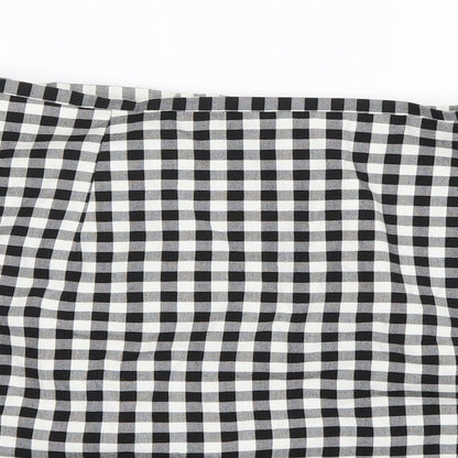 Close-up detail of New Look women’s white check a-line skirt, size UK 12
