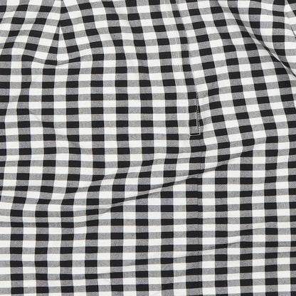Brand and care label for New Look women’s white check a-line skirt, size UK 12