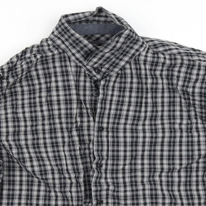 Close-up detail of Easy men’s black check button-up, size L