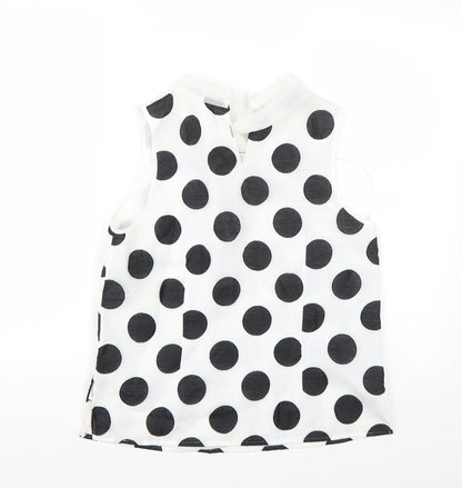 Back view of Coast women’s white polka dot basic blouse, size UK 10