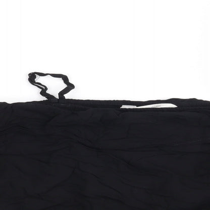 Close-up detail of H&M girls’ black basic blouse, size 11, years